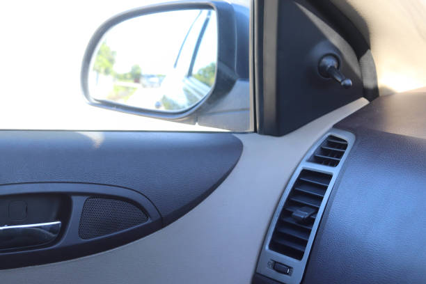 AC Vent on Interior of Car Dashboard and Mirror Adjustment Gear