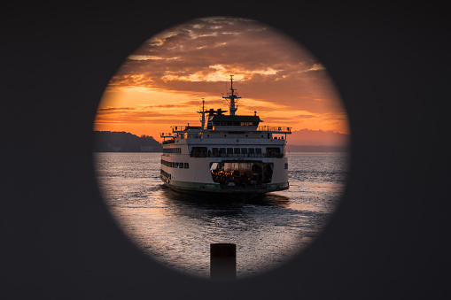Elliott bay sunset with a Bainbridge Island ferry.