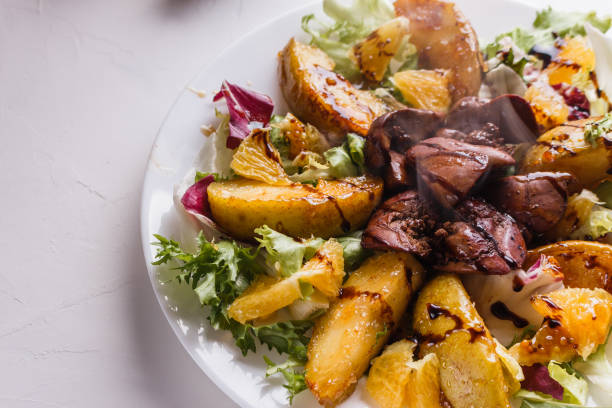 istock Baked potatoes with boiled chicken liver on a plate 1185472743