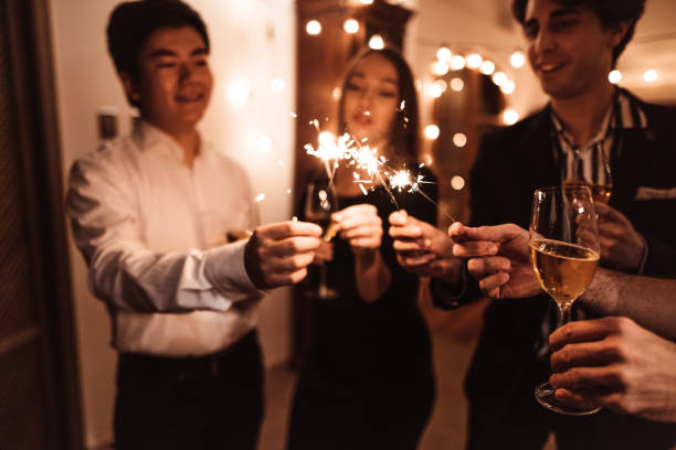 istock friends celebrating at home 1185473041