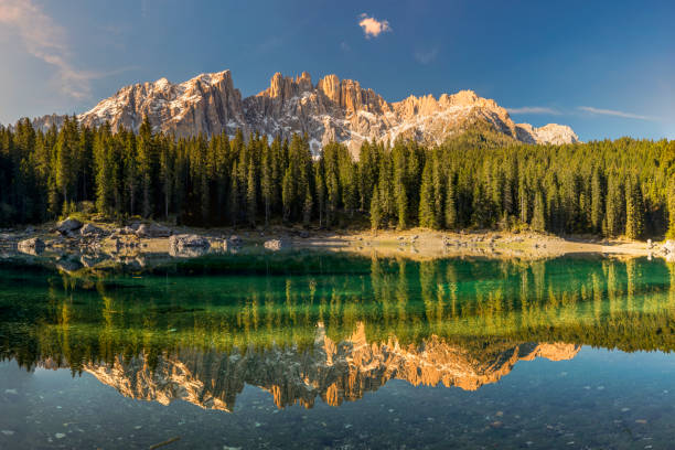 istock Lake with mountain forest landscape, Lago di Carezza at Sunrise 1185474496