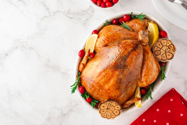 istock Christmas chicken in a white ceramic form on a light background. Christmas atmosphere. 1185474535