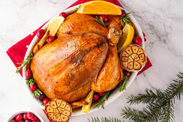 istock Christmas chicken in a white ceramic form on a light background. Christmas atmosphere. 1185474543