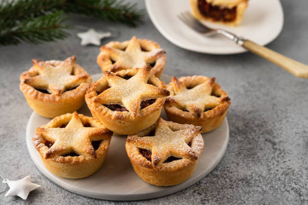 istock Delicious fruit mince tarts for Christmas dinner. Grey background, selective focus 1185474797