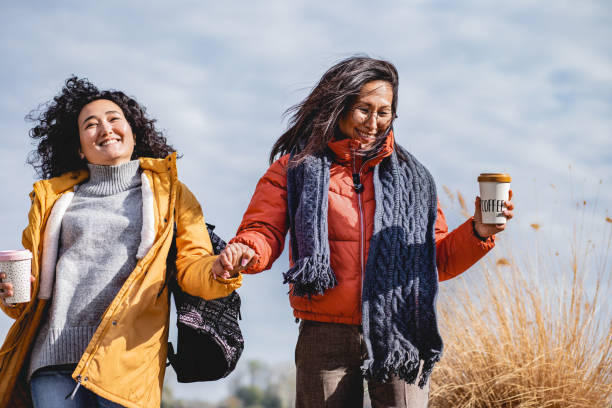 istock Two Asian women enjoy in nature 1185475439