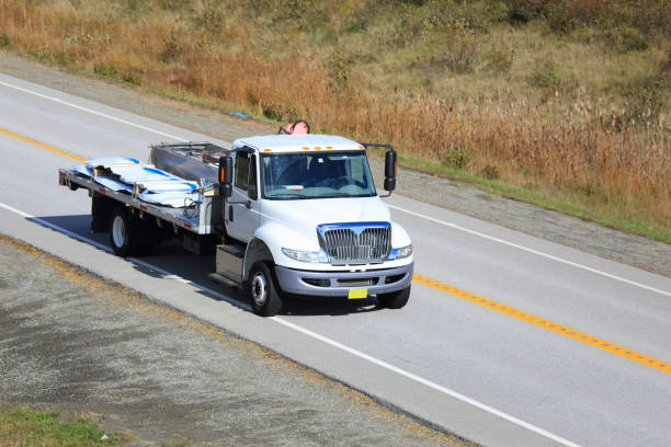 istock Flat bed truck on a highway 1185475994
