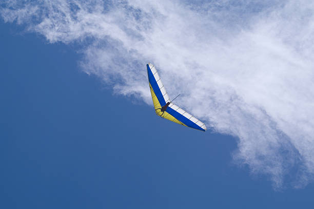 People flying in the powered hang glider