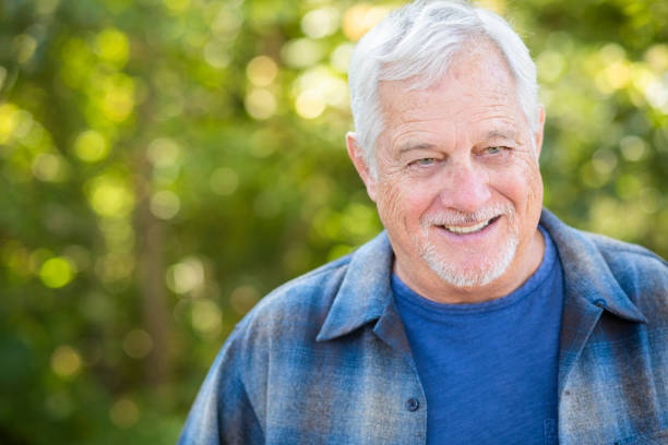 istock Happy senior man smiling 1185478851