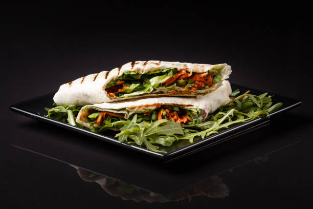 istock Vegetarian delicious pita with arugula and carrots 1185481563