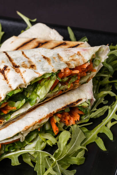 istock Vegetarian delicious pita with arugula and carrots 1185481564