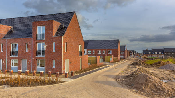 istock Newly built houses in modern street 1185490782