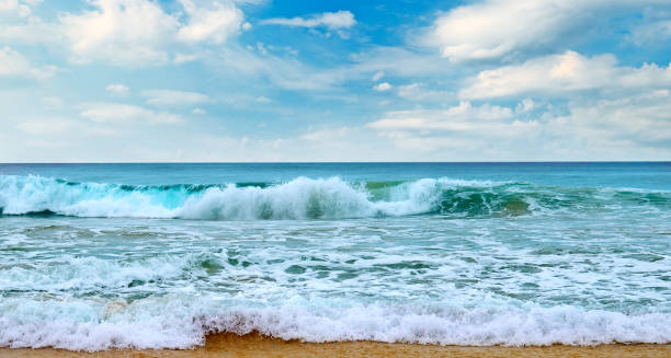 Beautiful seascape and blue sky. Sand beach.