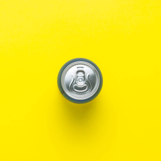 istock Tin can with a drink on a yellow background. minimalism. Flat lay, top view. 1185495693
