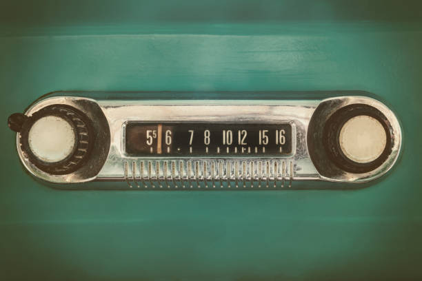 Retro styled image of an old car radio Retro styled image of an old car radio inside a green classic car radio retro revival old old fashioned stock pictures, royalty-free photos & images