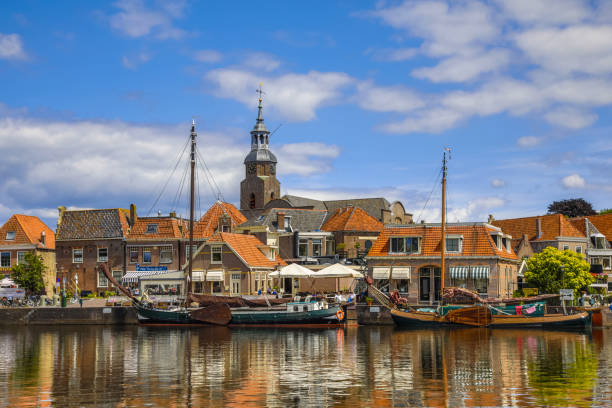 istock Harbor scene in historic dutch village 1185500337