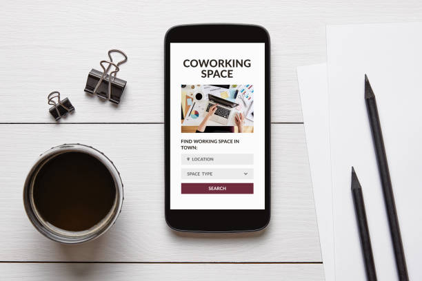 istock Coworking space concept on smart phone screen 1185501442