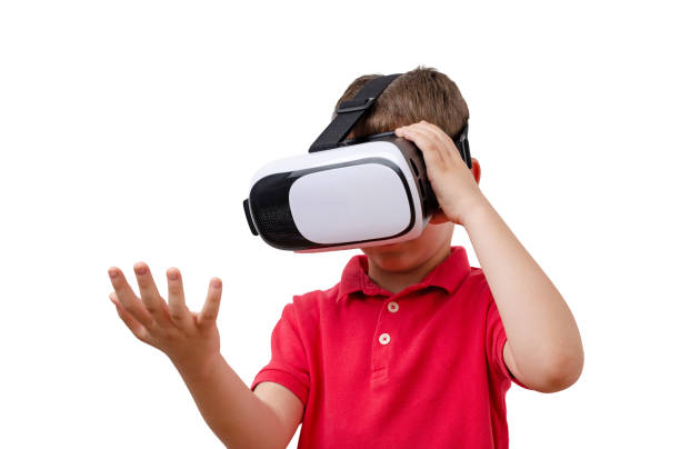 istock Isolated boy with virtual reality glasses with outstretched hand, as if holding something in it. 1185502071