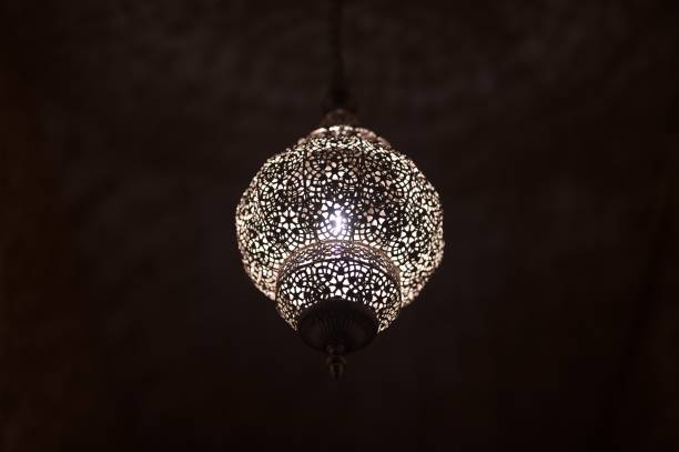 istock chandelier in a dark room 1185504787