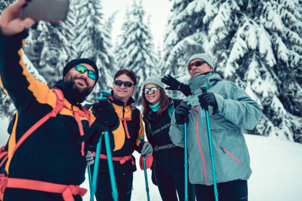 istock Alpinist Crew Taking A Selfie At Mountain Peak 1185508705