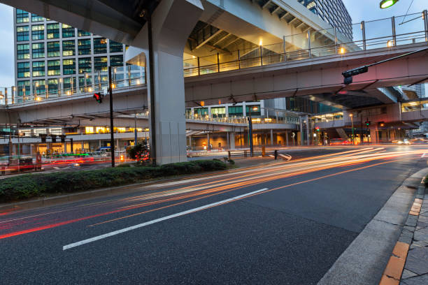 modern architecture. elevated highways and skyscrapers in tokyo. - shiodome urban scene blurred motion tokyo prefecture imagens e fotografias de stock