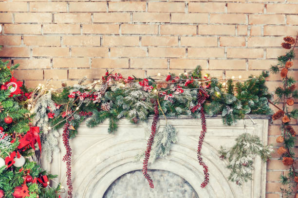 istock Classic christmas New Year decorated interior room New year tree and fireplace 1185514580