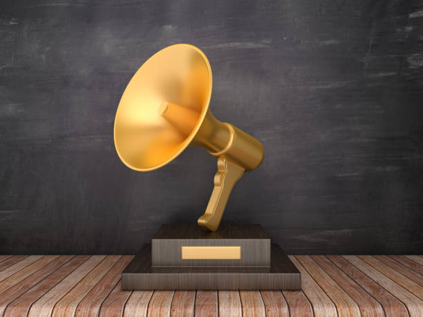 istock Trophy with Megaphone on Wood Floor - Chalkboard Background - 3D Rendering 1185514695