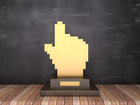 Trophy with Computer Hand Cursor on Wood Floor - Chalkboard Background - 3D Rendering