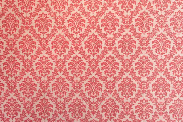 Red wallpaper vintage flock with red damask design on a white background retro vintage style