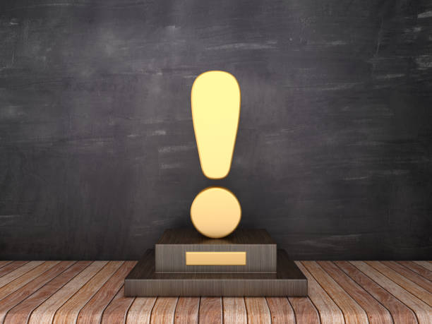 istock Trophy with Exclamation Point on Wood Floor - Chalkboard Background - 3D Rendering 1185515750