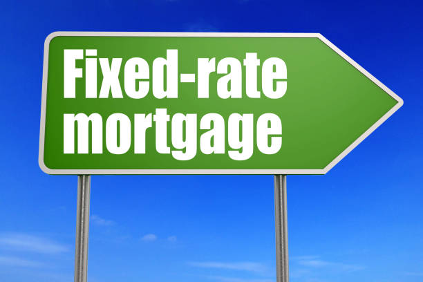 istock Fixed-rate mortgage word on green road sign 1185515841