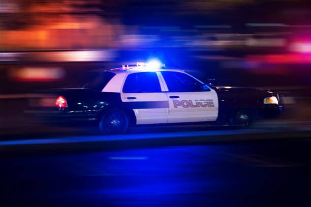 Police A Police unit responds to the scene of an emergency. police car photos stock pictures, royalty-free photos & images