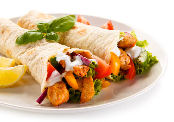 istock Kebab - grilled meat and vegetables on white background 1185519428