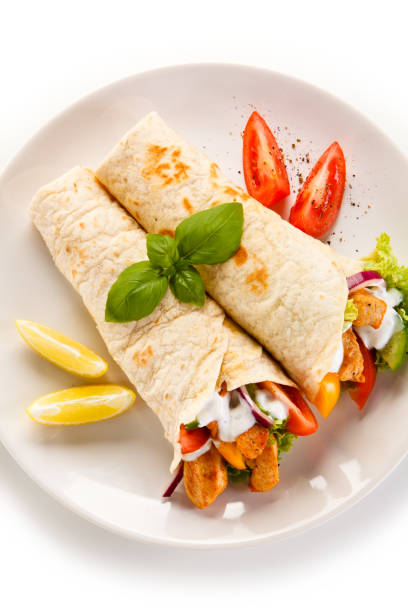 istock Kebab - grilled meat and vegetables on white background 1185519448