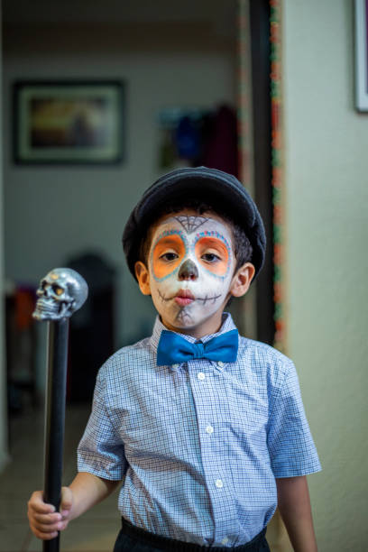istock Latin child Mexican skull makeup, catrin 1185519716