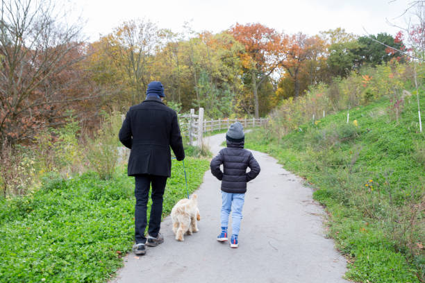 istock Father, son and dog 1185519752