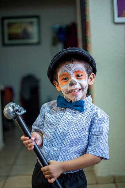 istock Latin child Mexican skull makeup, catrin 1185520307