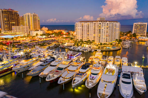 Multimillion dollar yachts in Fort Lauderdale twilight aerial photo boat show stock photo