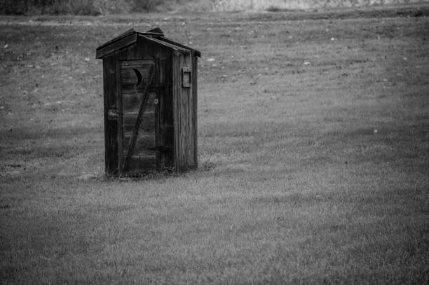 istock A lone rustic outhouse abandoned in the country 1185522057