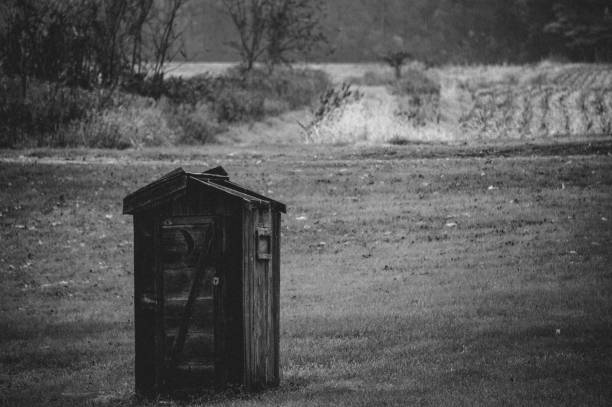 istock A lone rustic outhouse abandoned in the country 1185523526