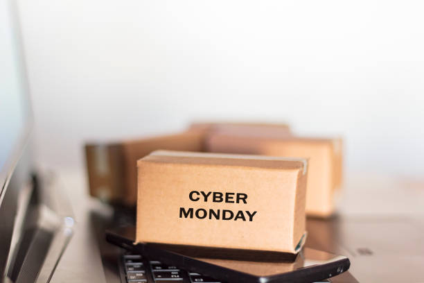 istock Carton box, smartphone and computer. Online shopping, e-commerce, Cyber Monday concept 1185526695