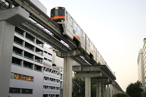 Tokyo,Japan-November 2, 2019: A monorail running on elevated track near Tachikawa station, Tokyo, in the evening