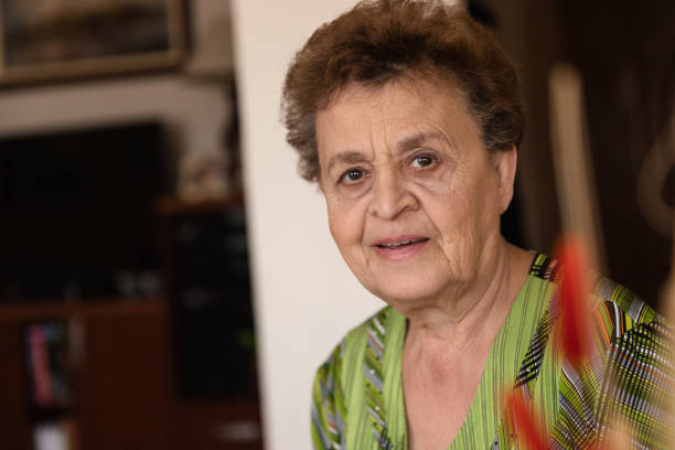 istock Old woman at home 1185526950