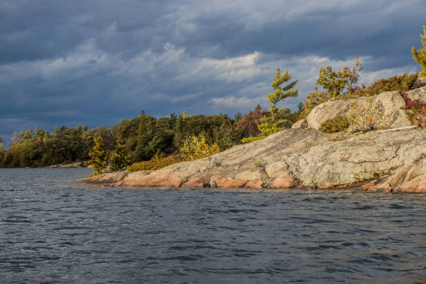 istock rocks, trees and water Beausoleil Island 1185534561