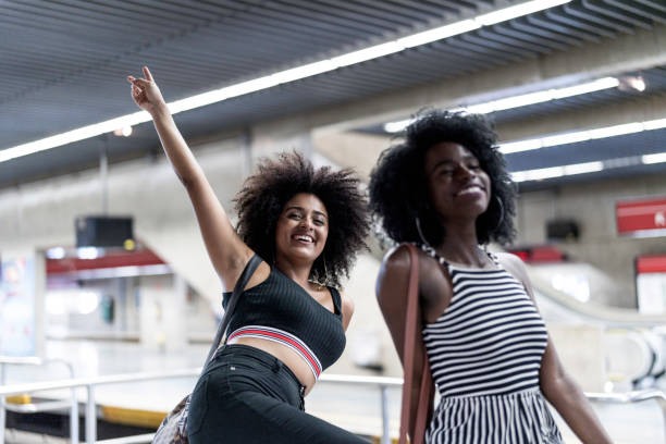 istock Friends posing and having fun in a subway station 1185535382