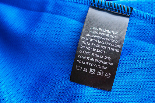 Permanent veiligheid dagboek Black Laundry Care Washing Instructions Clothes Label On Blue Jersey  Polyester Sport Shirt Stock Photo - Download Image Now - iStock