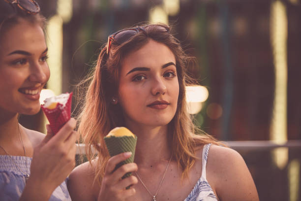 istock Women having refreshing dessert 1185536575