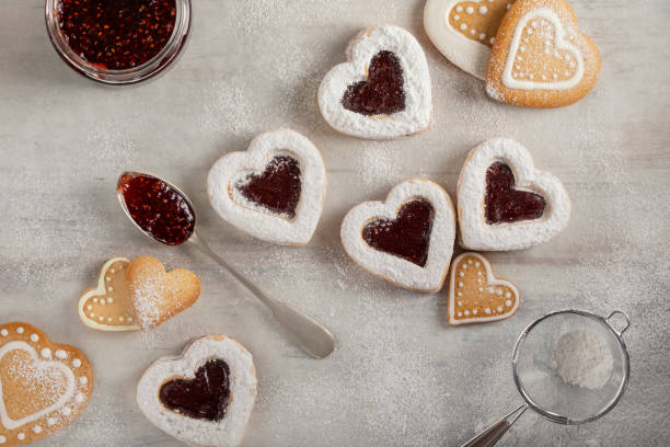istock Homemade heart shaped  cookies with raspberry jam 1185544434