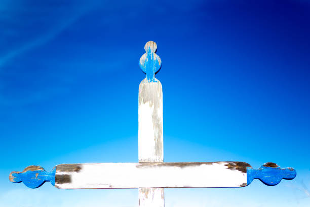 New Mexico: White Wood Cross Grave Marker, Close-Up. Shot near Taos.