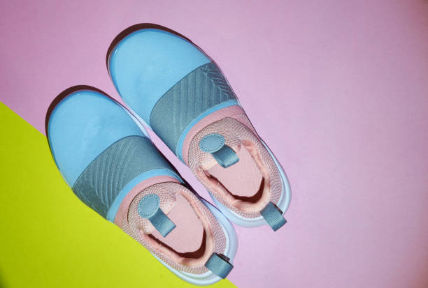 istock sport shoes top view on floor 1185552403