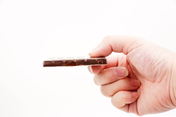 istock Piece of yummy milk chocolate 1185556607